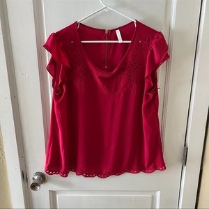 Red dressy blouse with eyelet details